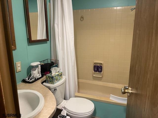 81 Flounder Ocean View, NJ 08230 - Photo 16 of 25 a bathroom with a sink a toilet and shower
