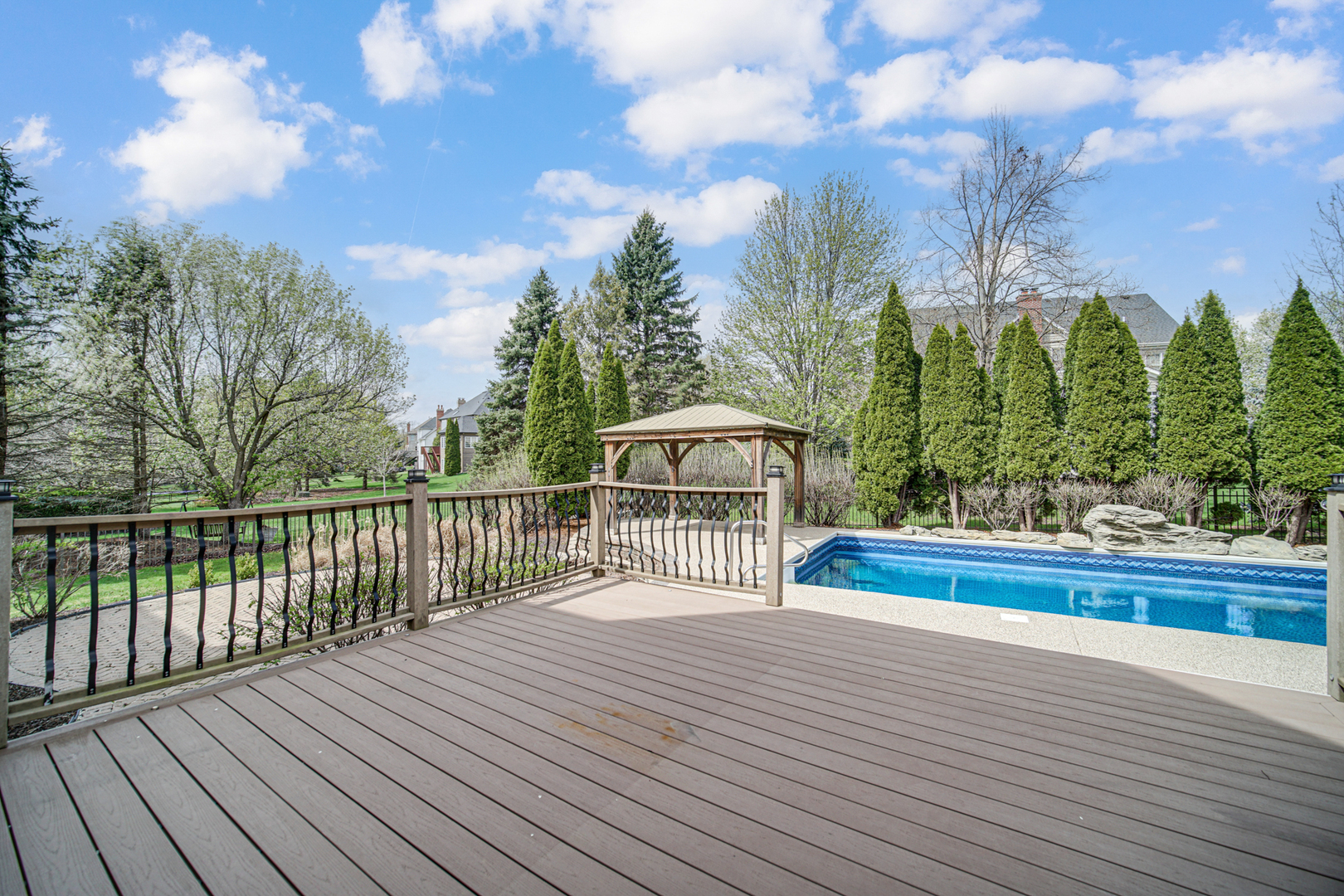 3N777 Walt Whitman Road St. Charles, IL 60175 - Photo 26 of 29 a view of a wooden deck with a yard