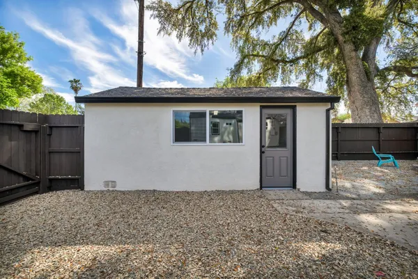 a house view with a backyard space