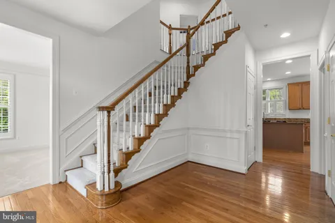 a view of room with window and hardwood floor