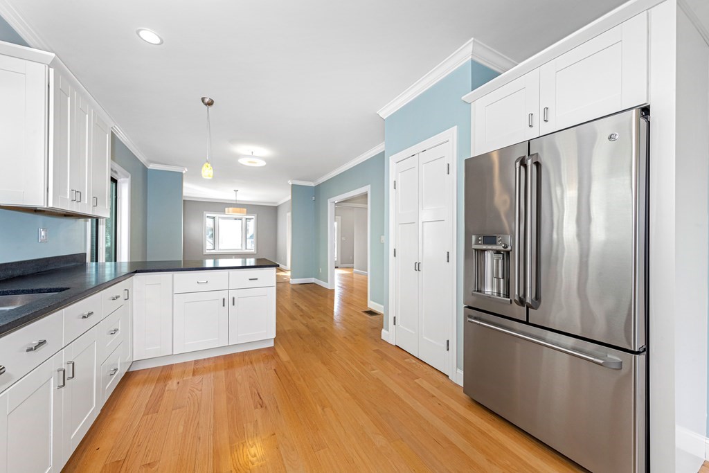 31 Knoll Street Boston, MA 02131 - Photo 14 of 34 a kitchen with stainless steel appliances a refrigerator sink and microwave