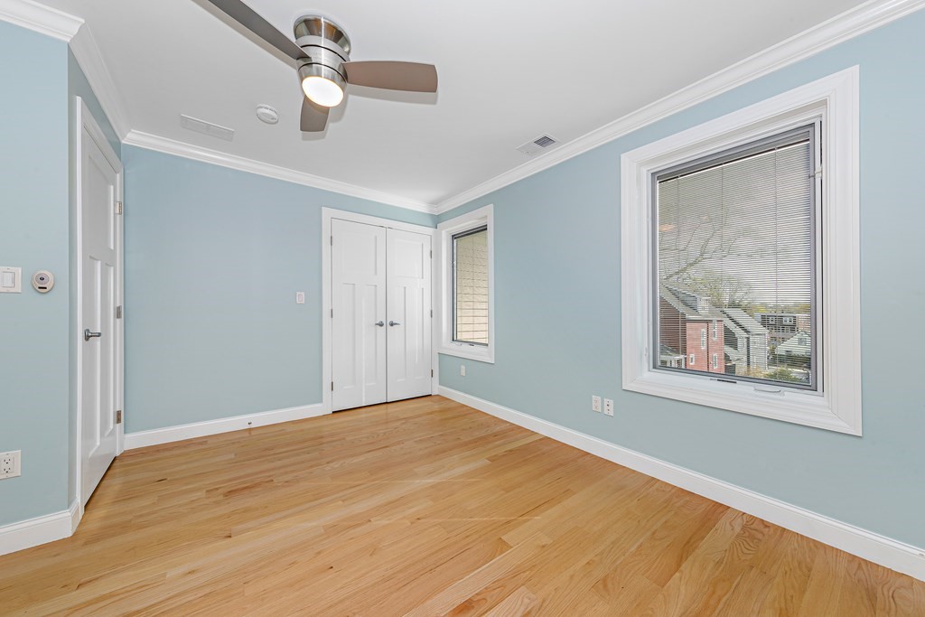 31 Knoll Street Boston, MA 02131 - Photo 26 of 34 a view of an empty room with a window and closet