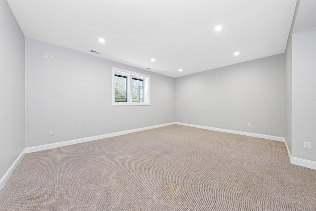 31 Knoll Street Boston, MA 02131 - Photo 32 of 34 a view of an empty room with a window