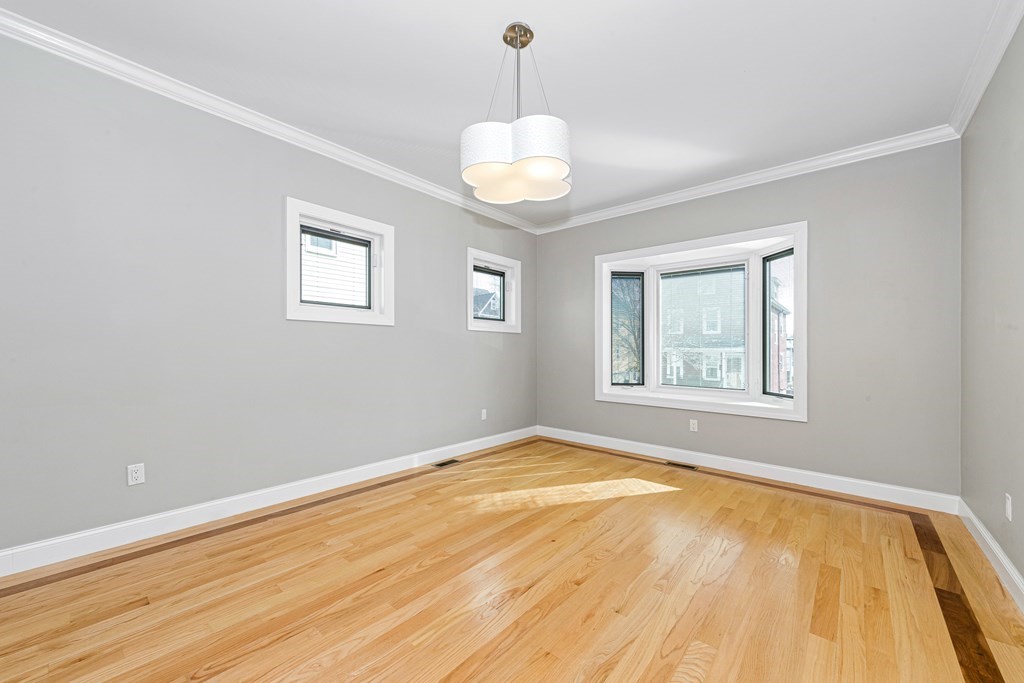 31 Knoll Street Boston, MA 02131 - Photo 8 of 34 a view of an empty room with a window