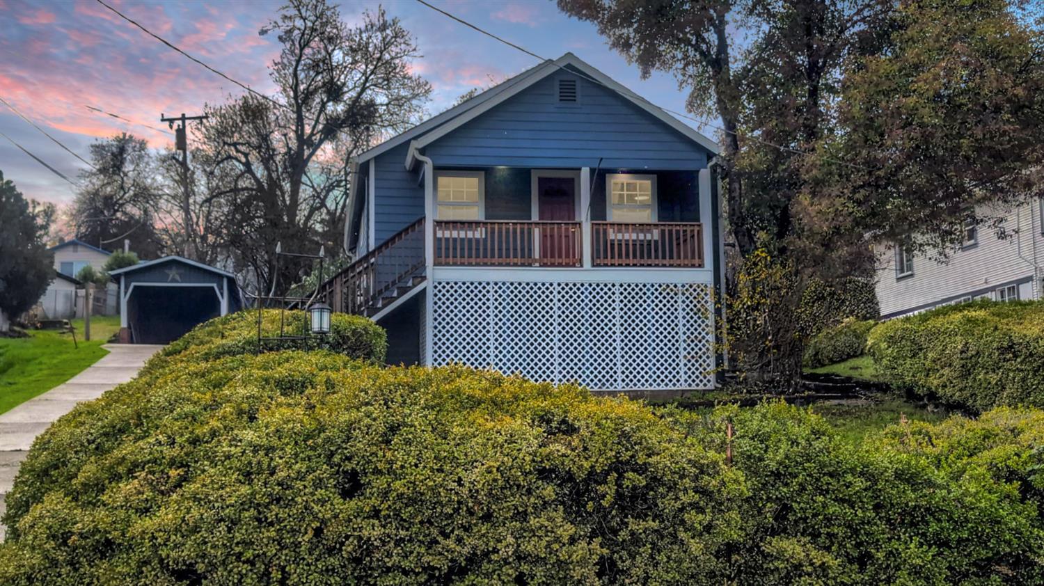 a view of a house with garden