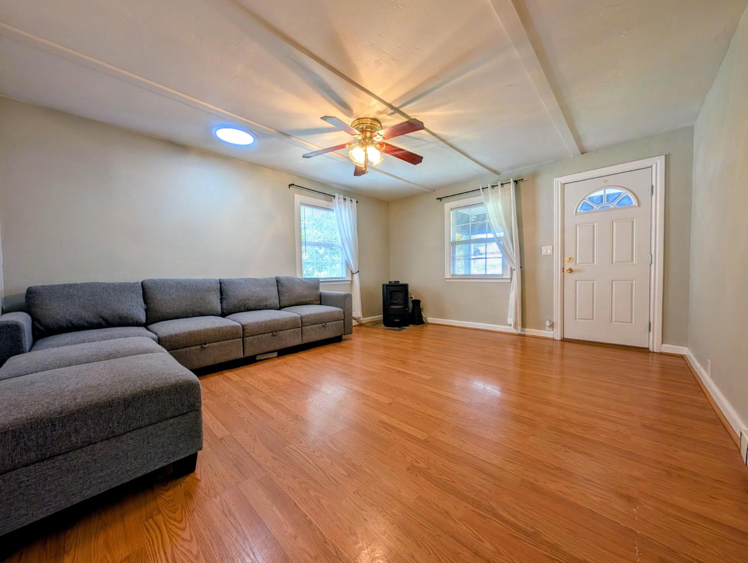 203 Market Street San Andreas, CA 95249 - Photo 12 of 54 a living room with furniture and a large window