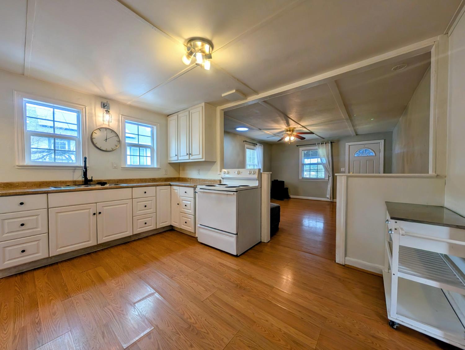 203 Market Street San Andreas, CA 95249 - Photo 17 of 54 a large kitchen with a lot of counter space and a wooden floors