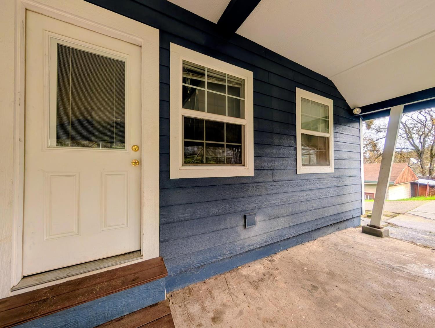 203 Market Street San Andreas, CA 95249 - Photo 40 of 54 a view of front door of house with wooden floor and door