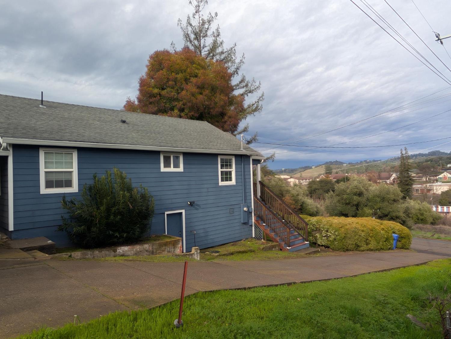 203 Market Street San Andreas, CA 95249 - Photo 41 of 54 a view of a house with a yard and plants