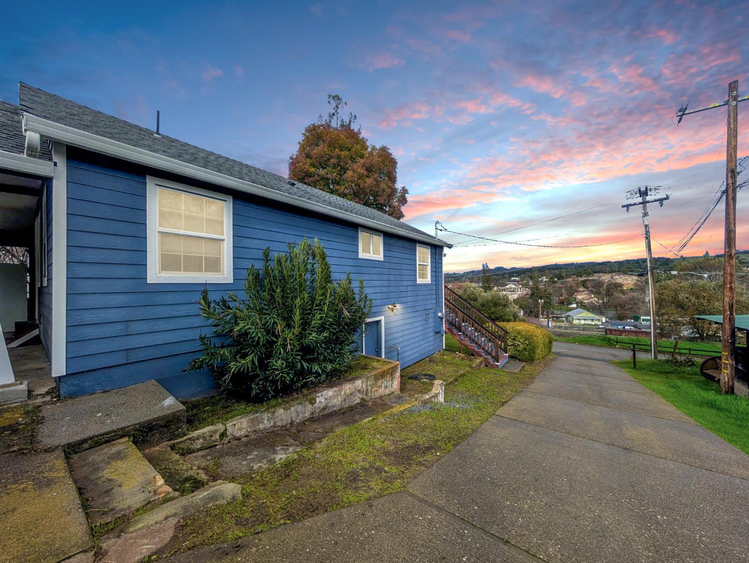 203 Market Street San Andreas, CA 95249 - Photo 5 of 54 a view of a backyard with plants and a patio