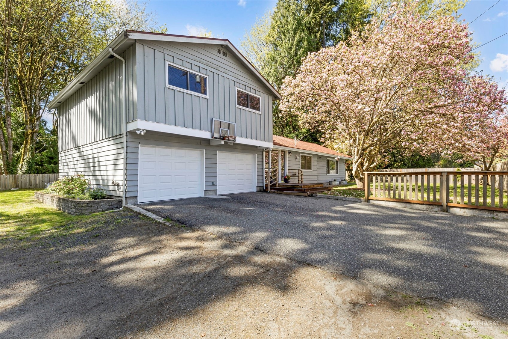 3741 Northeast Lincoln Road Poulsbo, WA 98370 - Photo 1 of 35 a view of a house with a yard