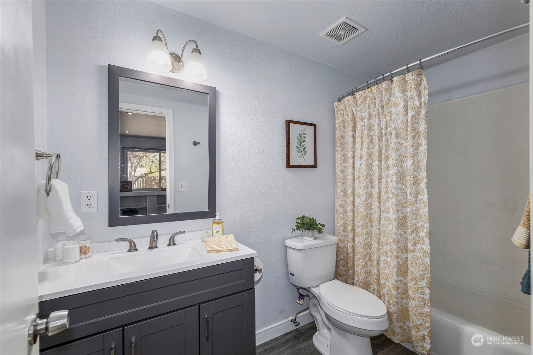 3741 Northeast Lincoln Road Poulsbo, WA 98370 - Photo 20 of 35 a bathroom with a sink vanity mirror and toilet