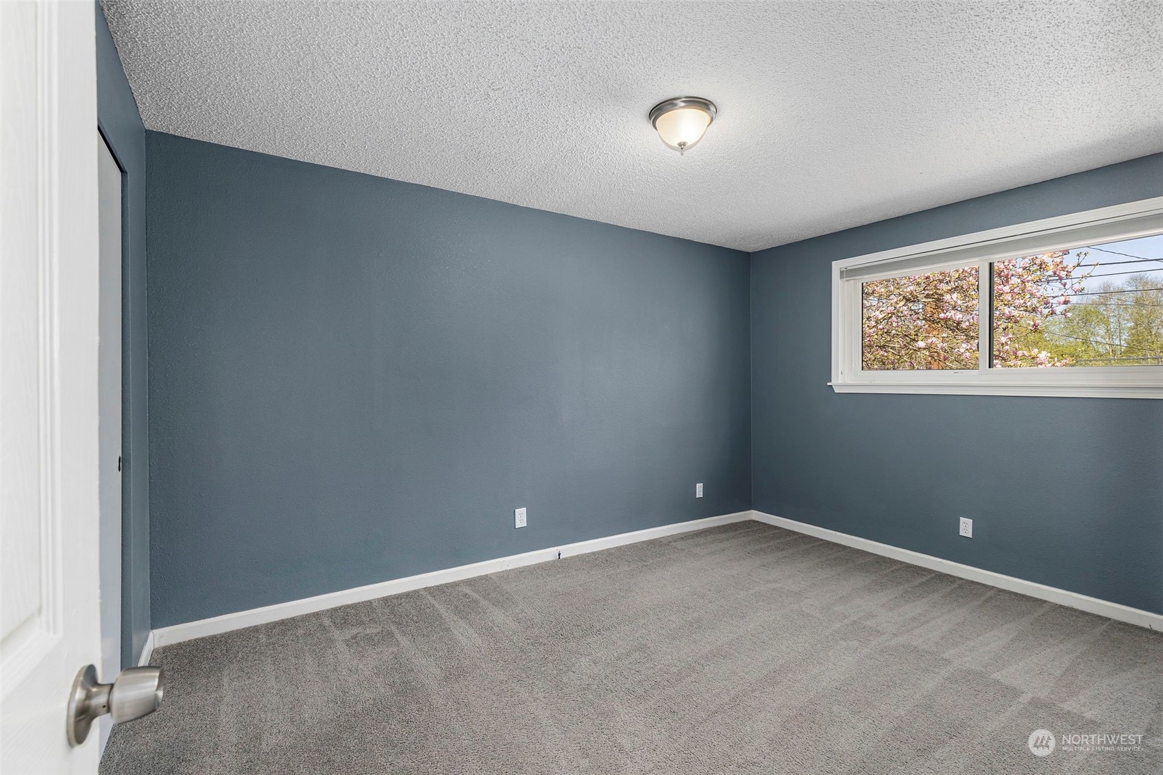 3741 Northeast Lincoln Road Poulsbo, WA 98370 - Photo 24 of 35 an empty room with windows