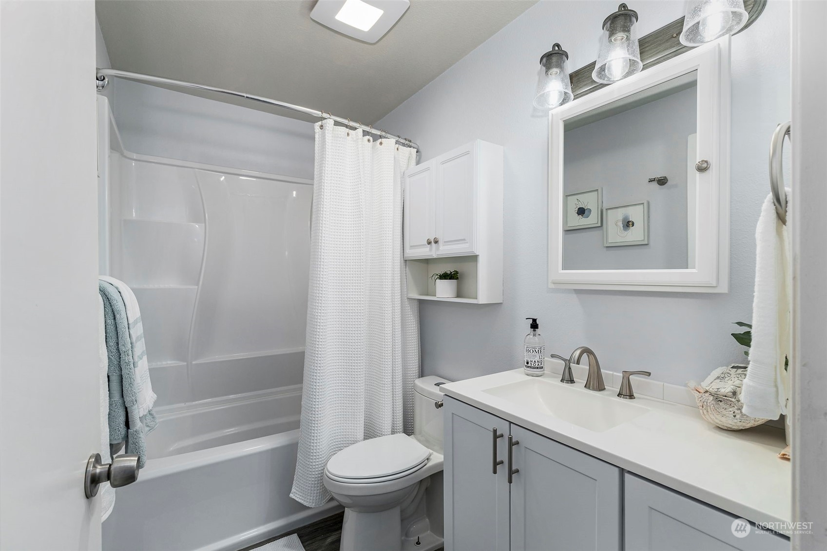 3741 Northeast Lincoln Road Poulsbo, WA 98370 - Photo 26 of 35 a bathroom with a sink toilet and shower