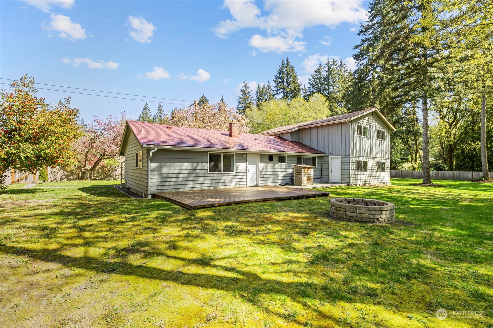 3741 Northeast Lincoln Road Poulsbo, WA 98370 - Photo 30 of 35 a view of a house with a swimming pool