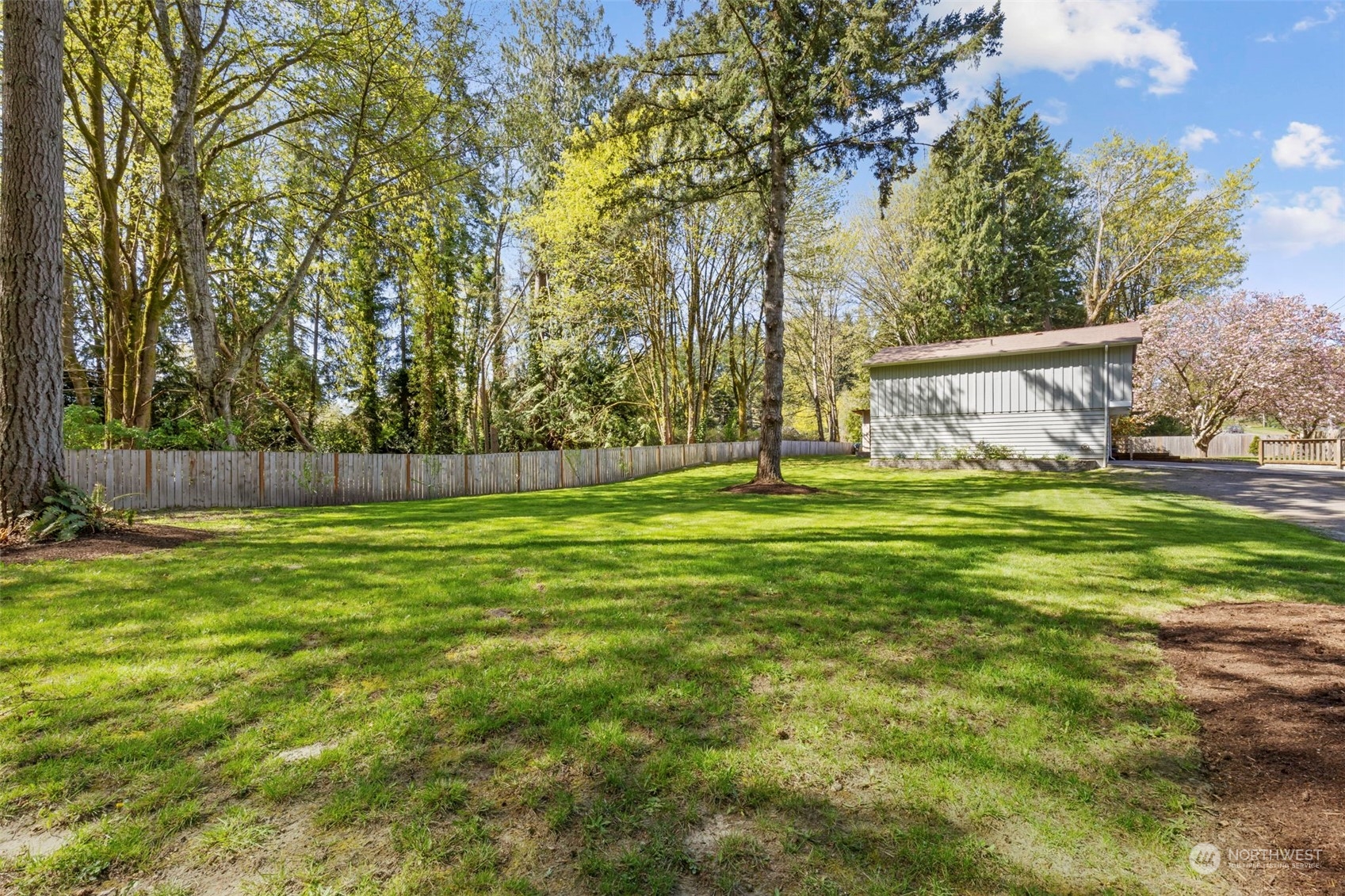 3741 Northeast Lincoln Road Poulsbo, WA 98370 - Photo 33 of 35 a view of a park with large trees