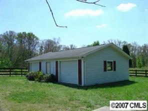 421 Nance Road Stanfield, NC 28163 - Photo 3 of 8 a view of a house with backyard