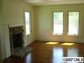 421 Nance Road Stanfield, NC 28163 - Photo 6 of 8 a view of an empty room and window