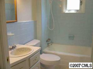 421 Nance Road Stanfield, NC 28163 - Photo 7 of 8 a bathroom with a sink a toilet and shower