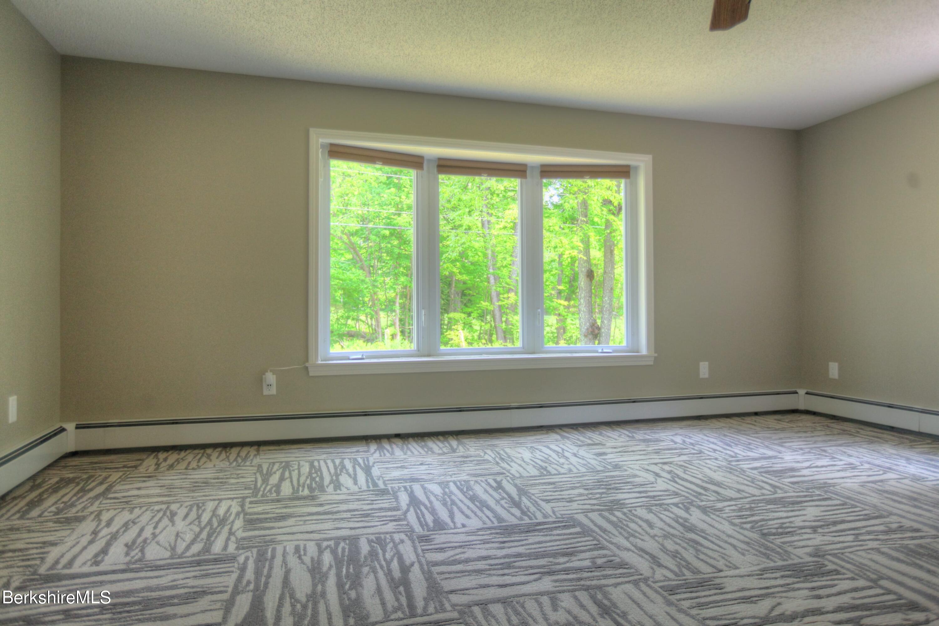 6 Roosterville Road Sandisfield, MA 01255 - Photo 15 of 35 a view of room with window and hardwood floor