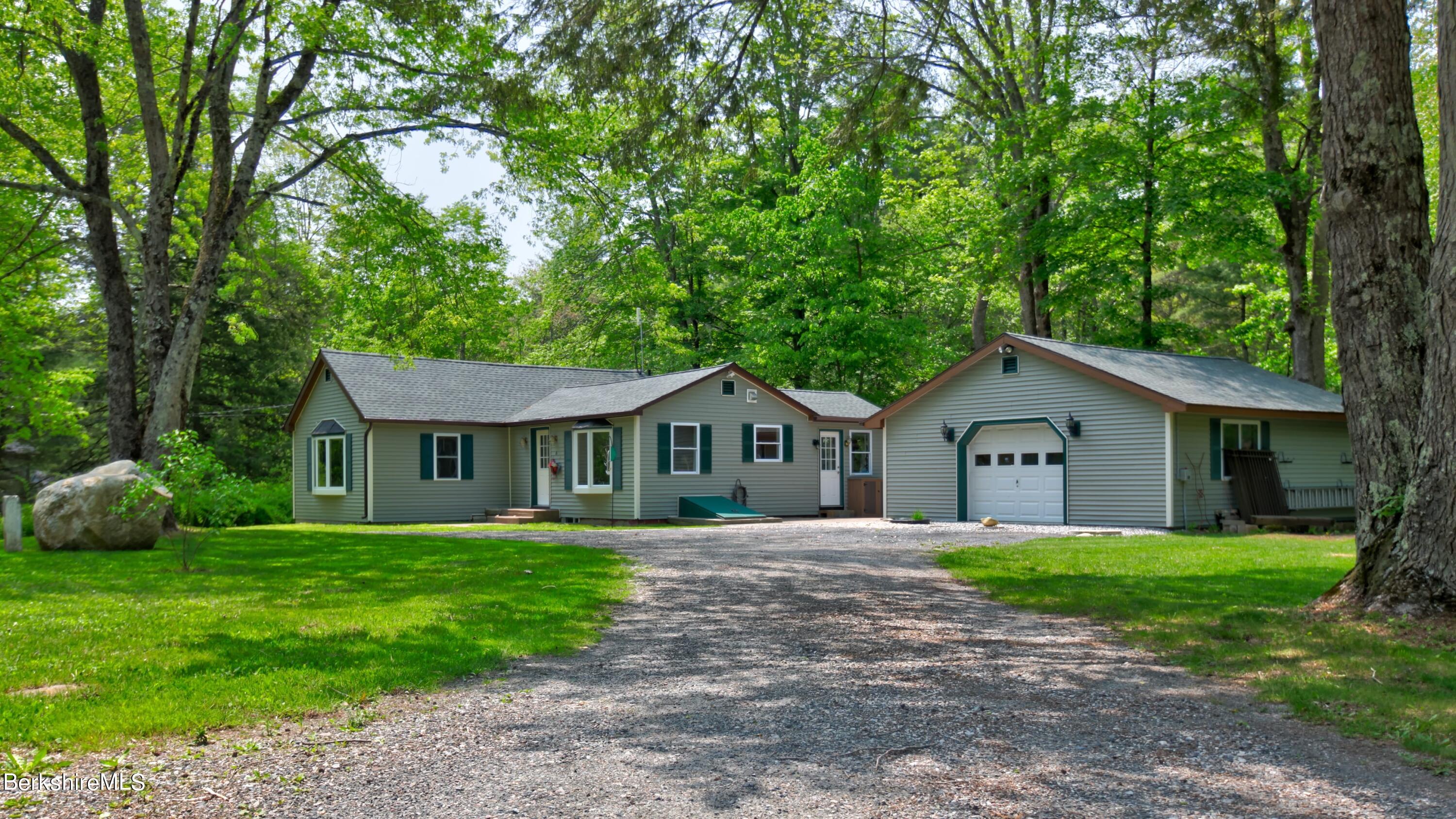 6 Roosterville Road Sandisfield, MA 01255 - Photo 33 of 35 a front view of a house with yard and green space