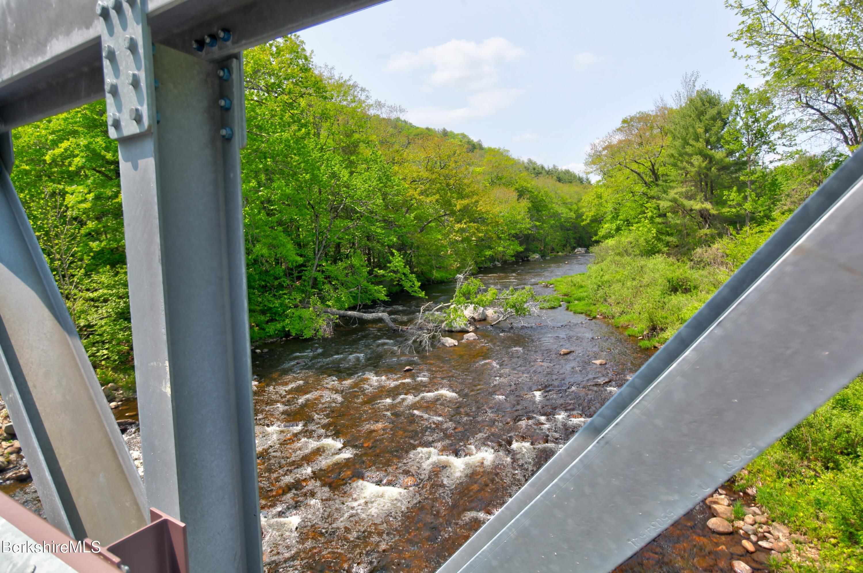 6 Roosterville Road Sandisfield, MA 01255 - Photo 5 of 35 a view of a garden from a balcony