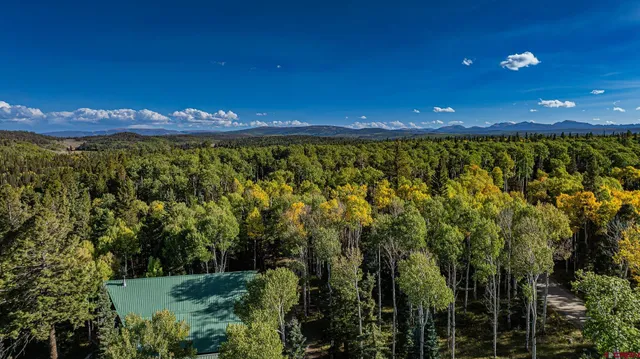 a view of a living room and bathroom