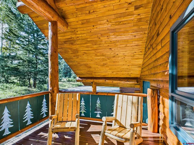 a living room with large windows