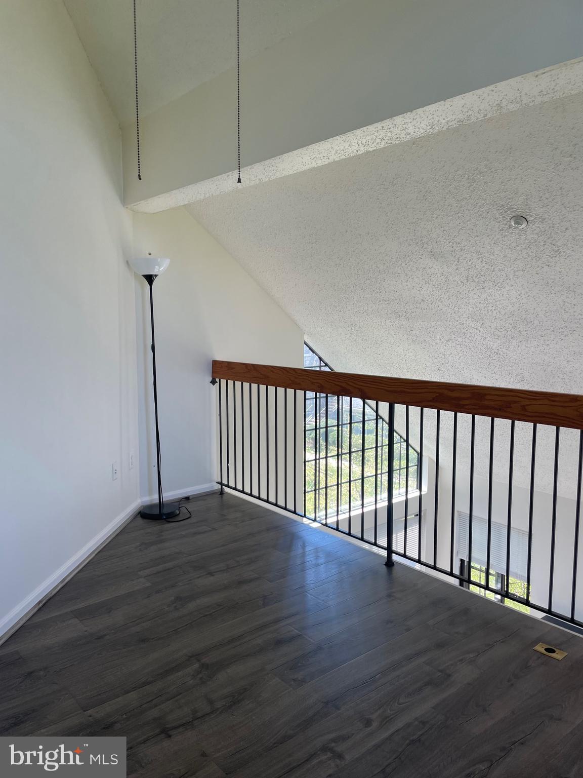 7000 Irwell Lane, Unit 11C Alexandria, VA 22315 - Photo 15 of 15 a view of a hallway with wooden floor