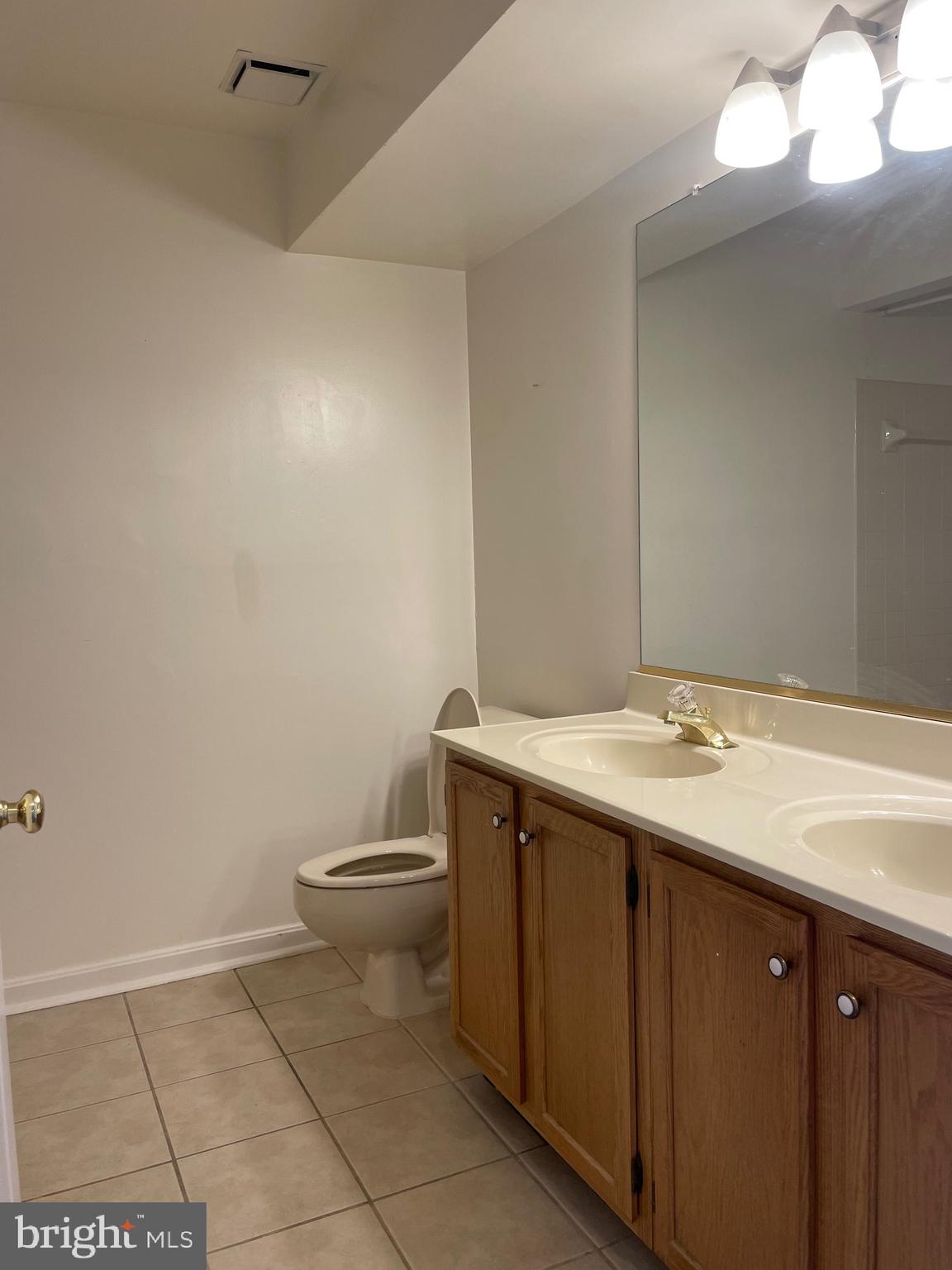 7000 Irwell Lane, Unit 11C Alexandria, VA 22315 - Photo 6 of 15 a bathroom with a sink and a toilet