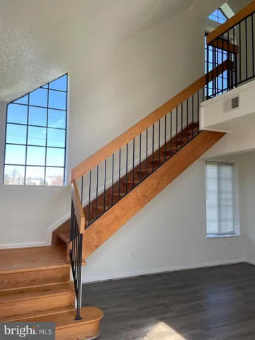 a view of entryway with wooden floor