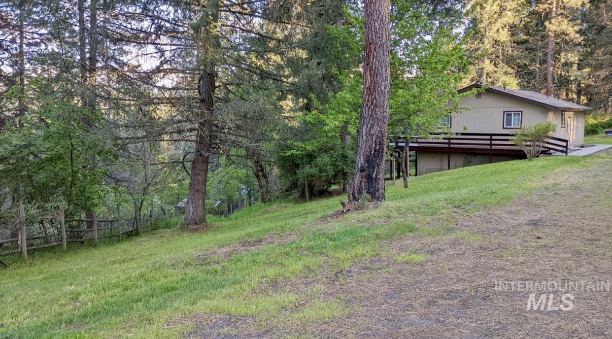 752 Mt Idaho Grade Road Grangeville, ID 83530 - Photo 28 of 29 View of yard featuring a deck