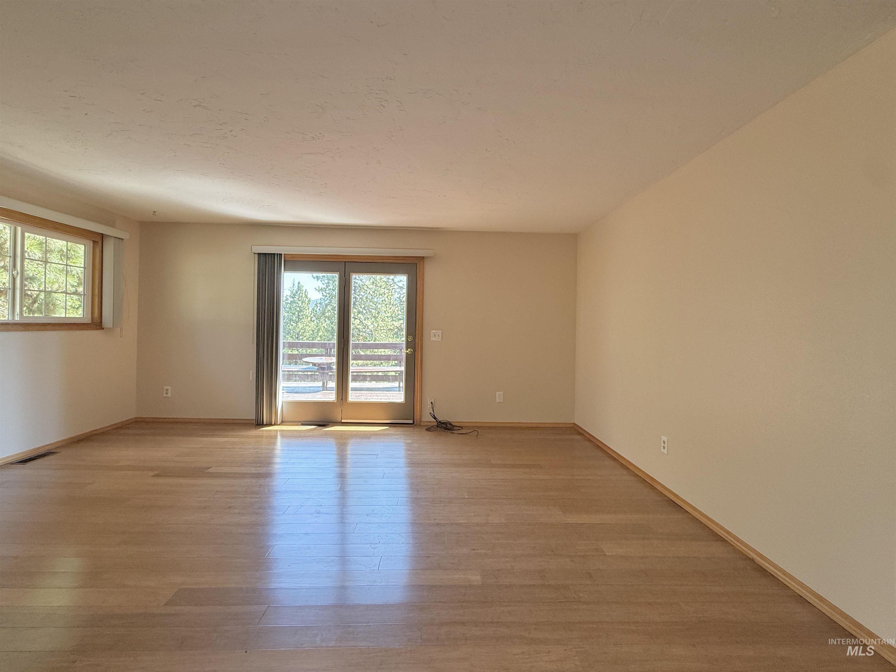 752 Mt Idaho Grade Road Grangeville, ID 83530 - Photo 5 of 29 Empty room with light wood-type flooring