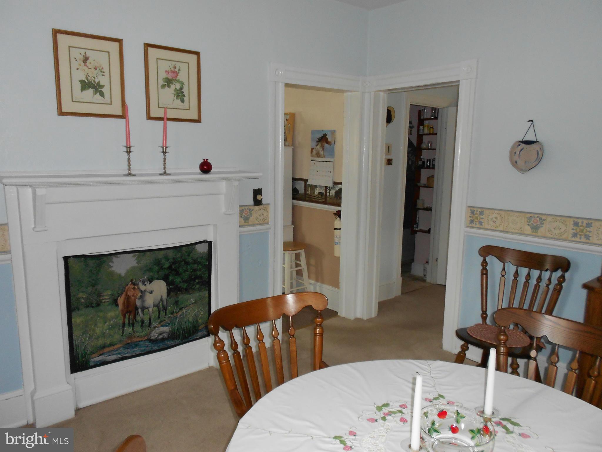 14191 Goldvein Road Goldvein, VA 22720 - Photo 11 of 27 a living room with furniture and a fireplace