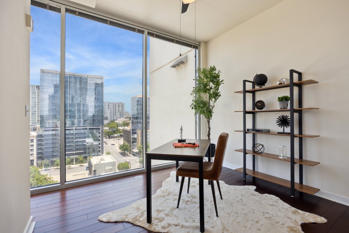 360 Nueces Street, Unit 1116 Austin, TX 78701 - Photo 10 of 33 a view of a workspace with furniture and a window