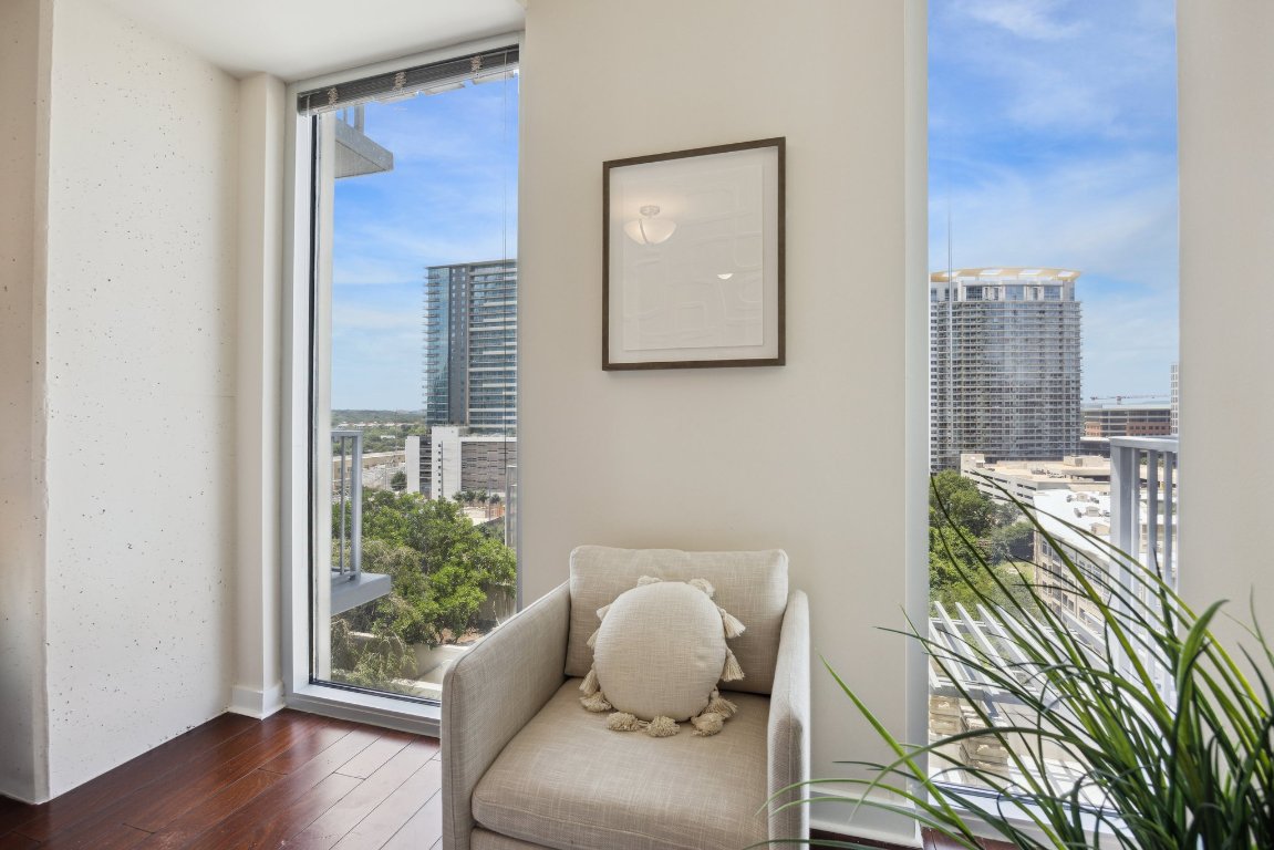 360 Nueces Street, Unit 1116 Austin, TX 78701 - Photo 16 of 33 a living room with furniture and a potted plant