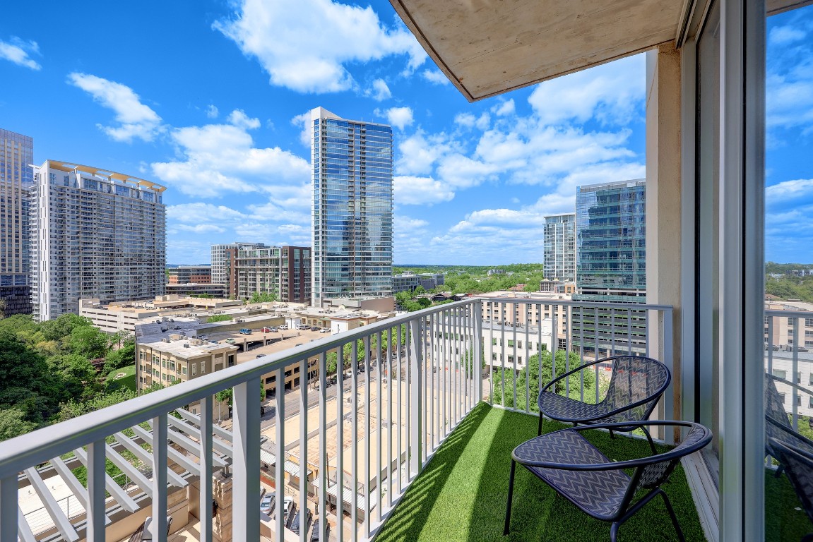 360 Nueces Street, Unit 1116 Austin, TX 78701 - Photo 22 of 33 a view of a balcony with chairs