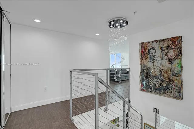 a view of a hallway with workspace