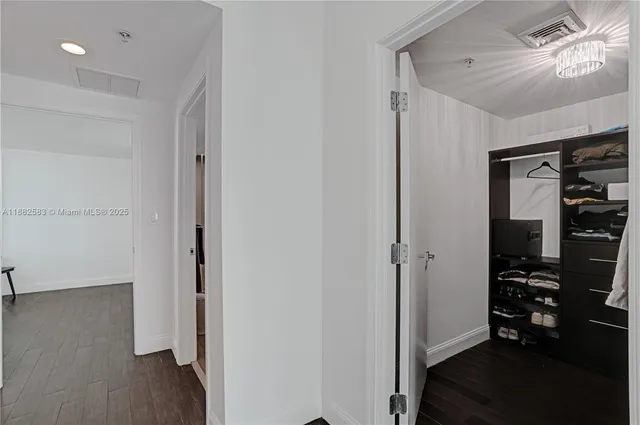 a view of walk in closet with furniture