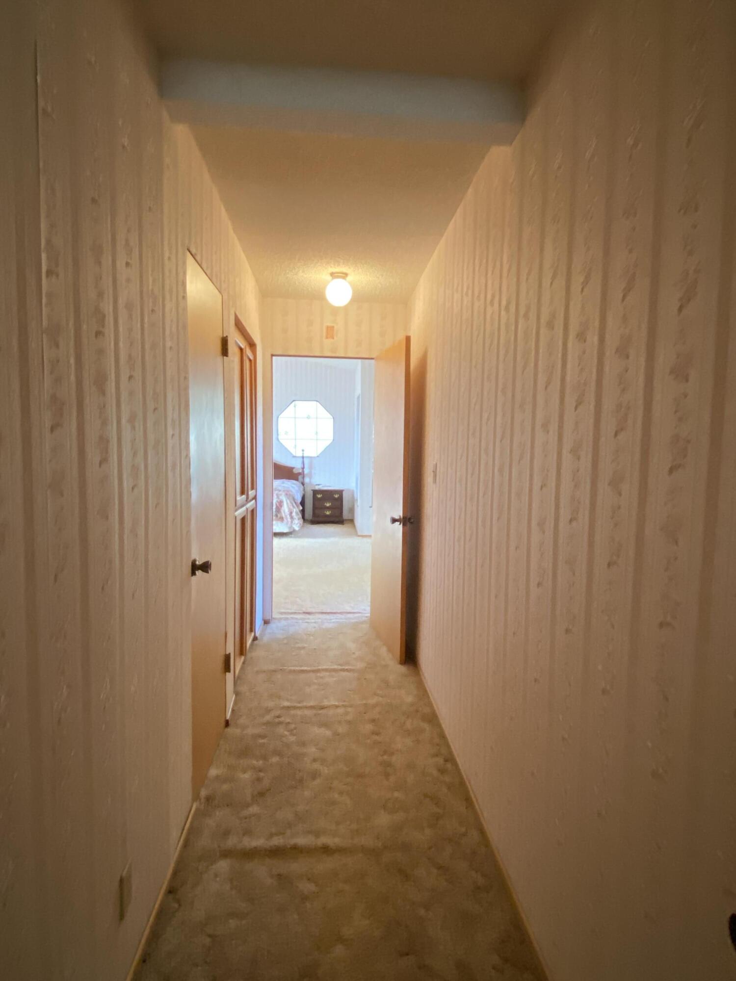5355 Campbell Road Lompoc, CA 93436 - Photo 15 of 35 a view of a bathroom from a hallway