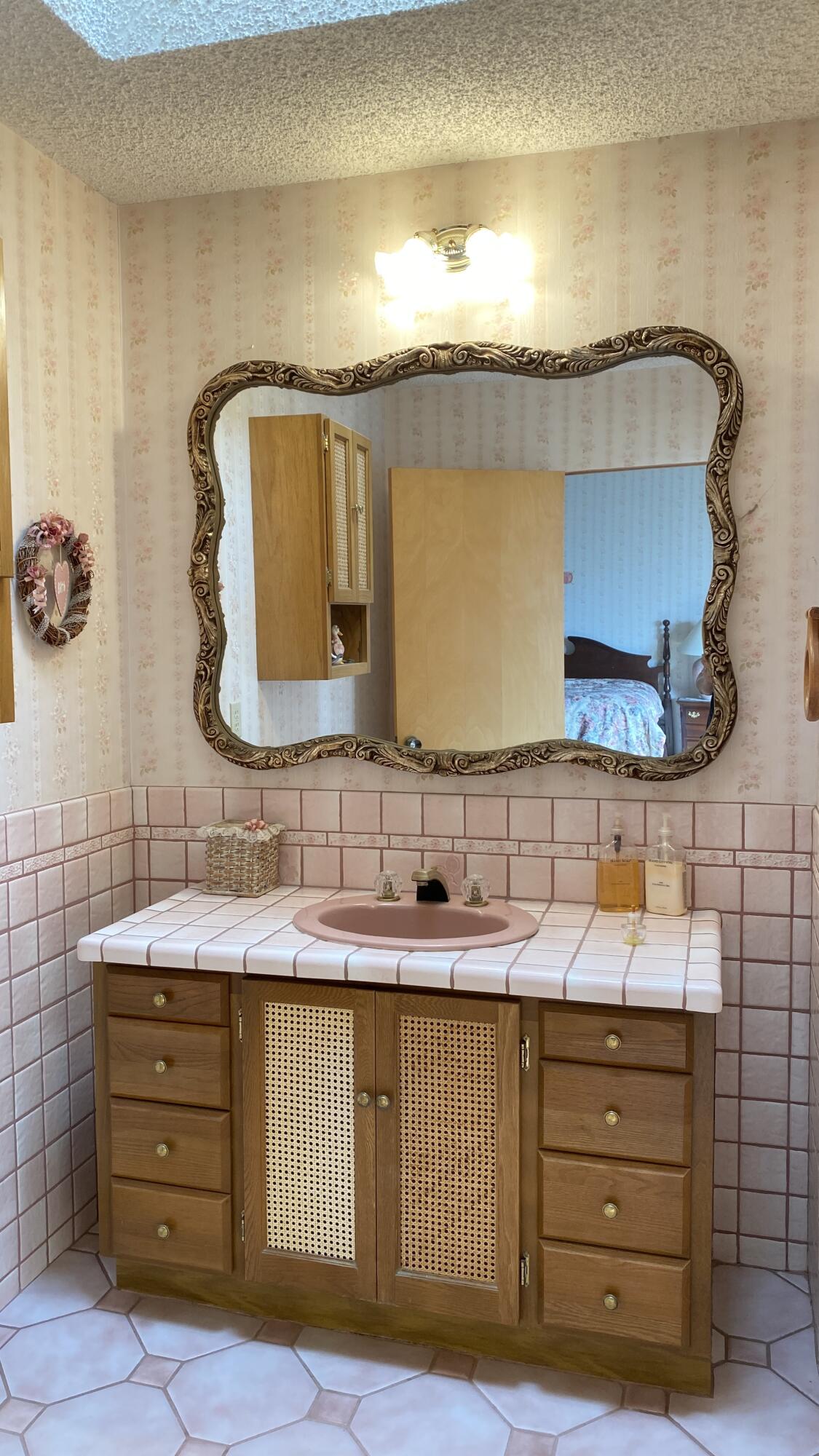 5355 Campbell Road Lompoc, CA 93436 - Photo 18 of 35 a bathroom with a sink and a mirror