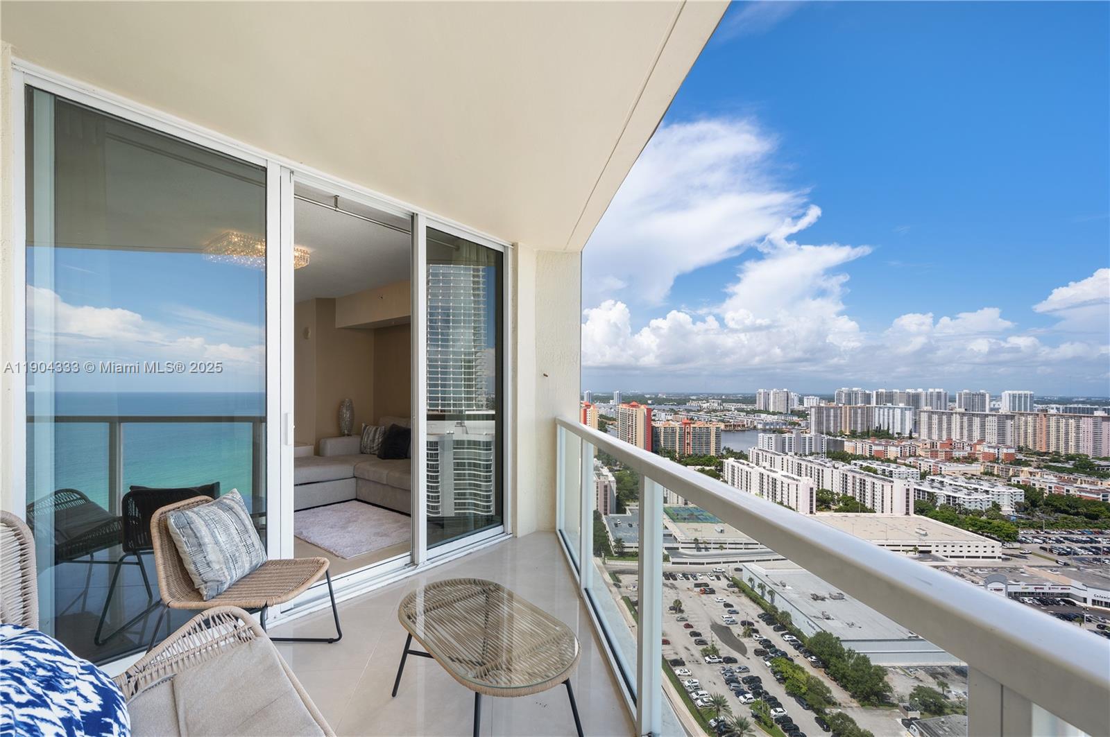 16699 Collins Avenue, Unit 3305 Sunny Isles Beach, FL 33160 - Photo 9 of 20 a view of balcony with furniture
