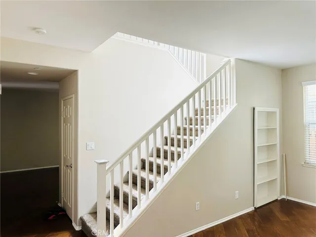 a view of entryway with wooden floor