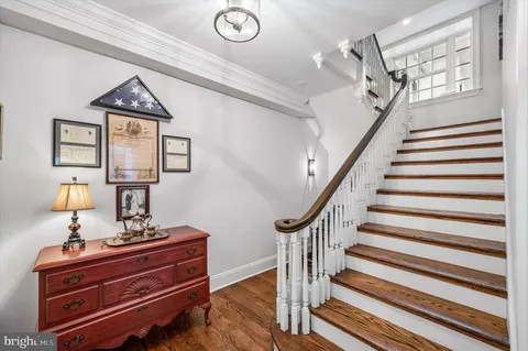 a view of entryway with wooden floor