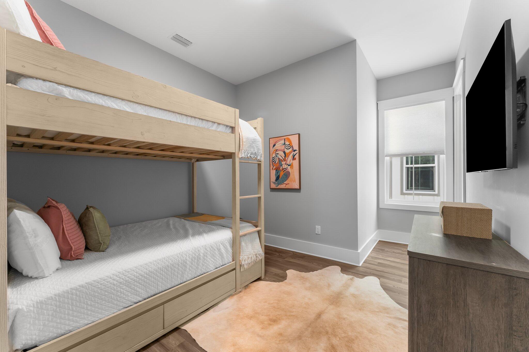 28 West Queen Palm Dr Inlet Beach Inlet Beach, FL 32461 - Photo 37 of 72 a bedroom with a bed and a flat screen tv