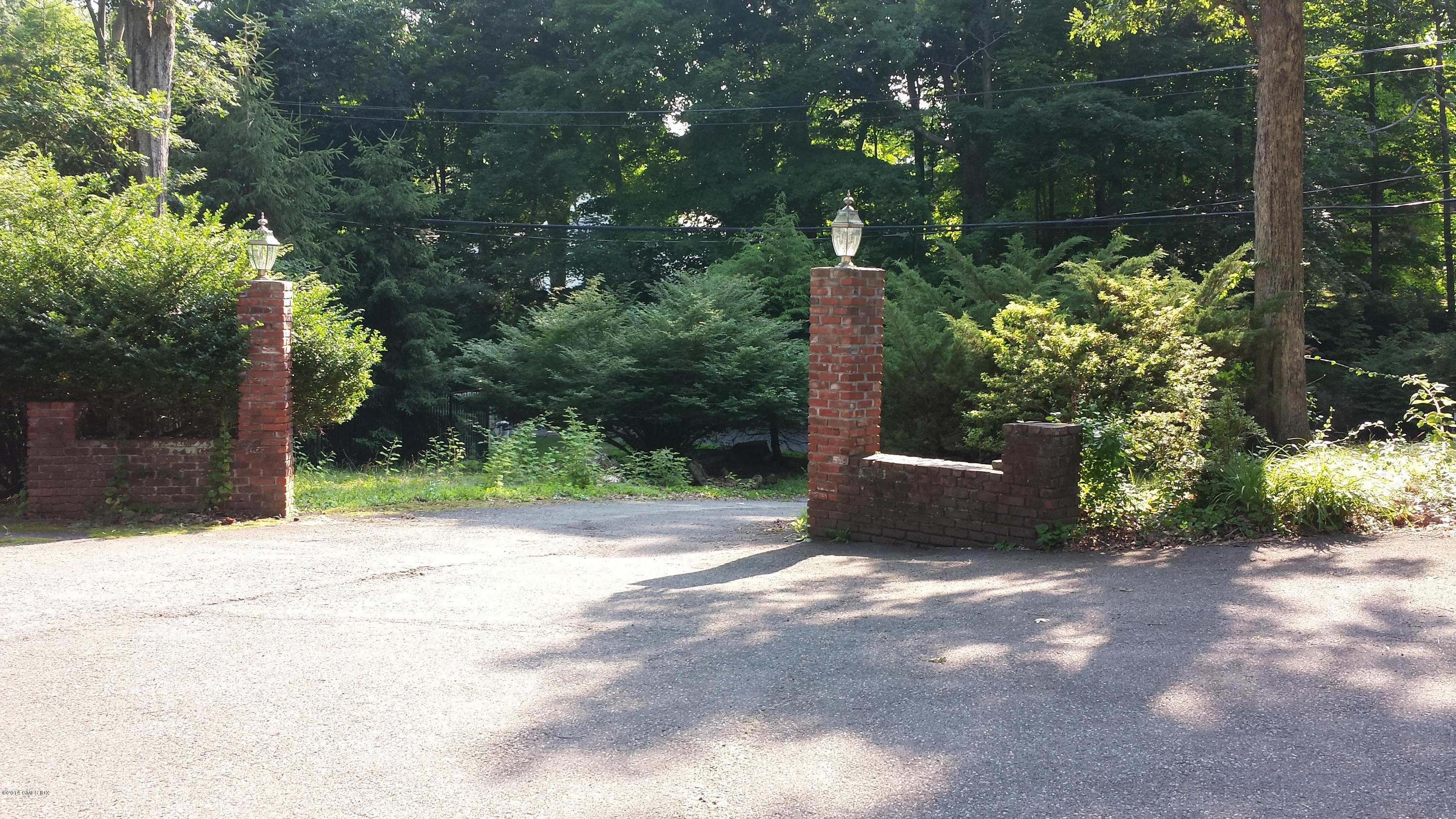 84 Perkins Road Greenwich, CT 06830 - Photo 2 of 11 a view of a outdoor space with a tree