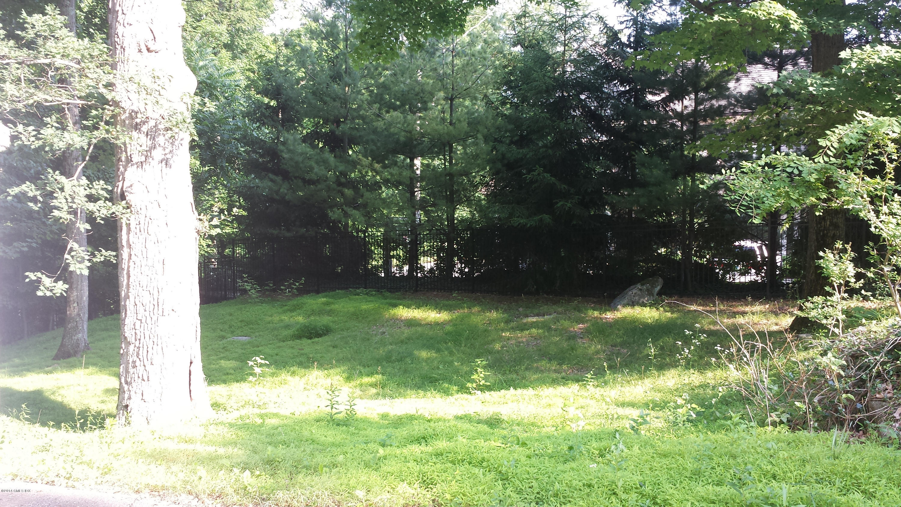 84 Perkins Road Greenwich, CT 06830 - Photo 8 of 11 a view of a yard