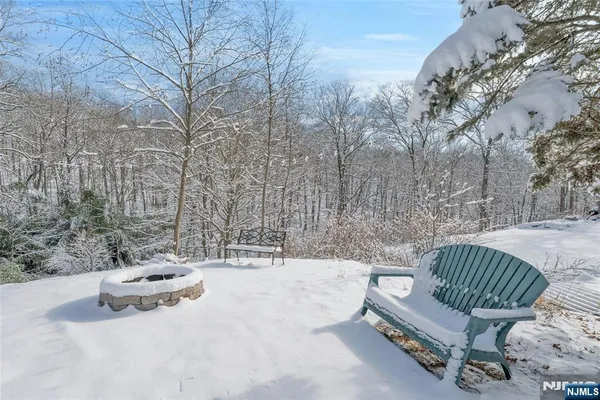 a view of a back yard of the house