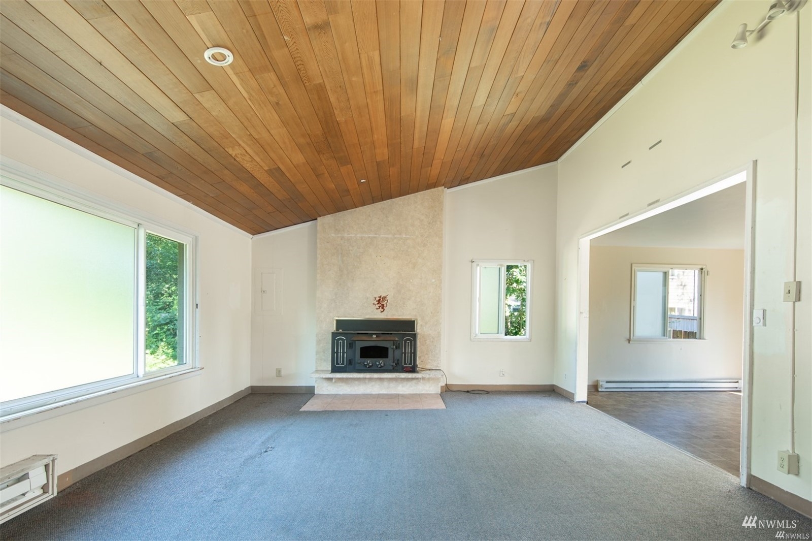 11919 East Gibson Road Everett, WA 98204 - Photo 8 of 27 a view of empty room with a fireplace