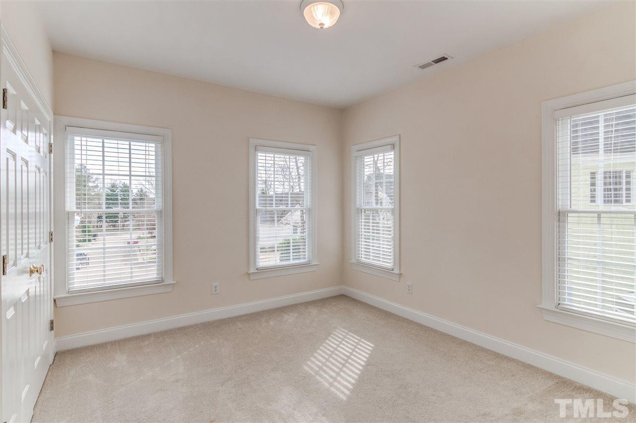 2401 Carruthers Court Raleigh, NC 27615 - Photo 13 of 25 a view of an empty room with a window